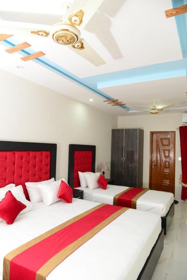 Hotel Deluxe Lahore Esterno foto